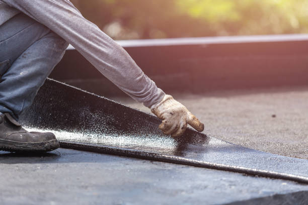 Professional Basement Waterproofing technician working in Bowling Green, KY